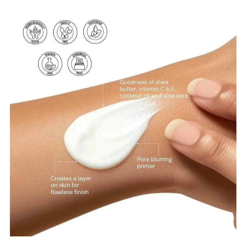 Hand applying cream to arm with product features highlighted